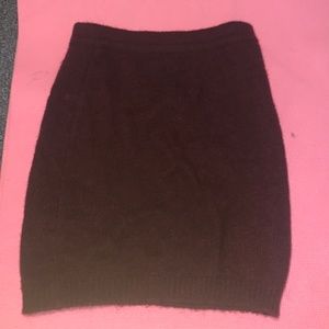 a thick skirt, good in the winter, stretchy. It’s a deep purple color.